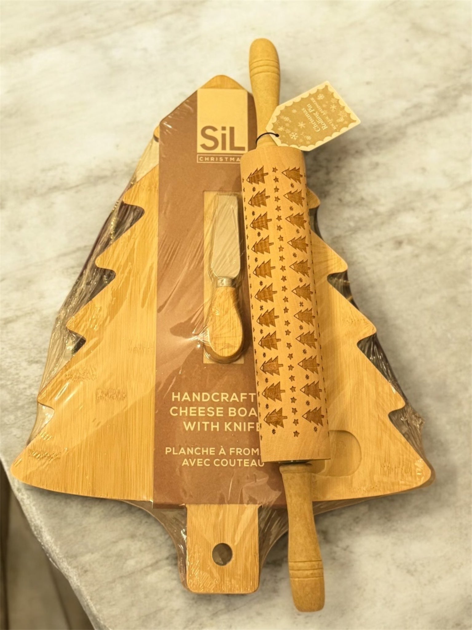 Cheese board with knife and festive rolling pin